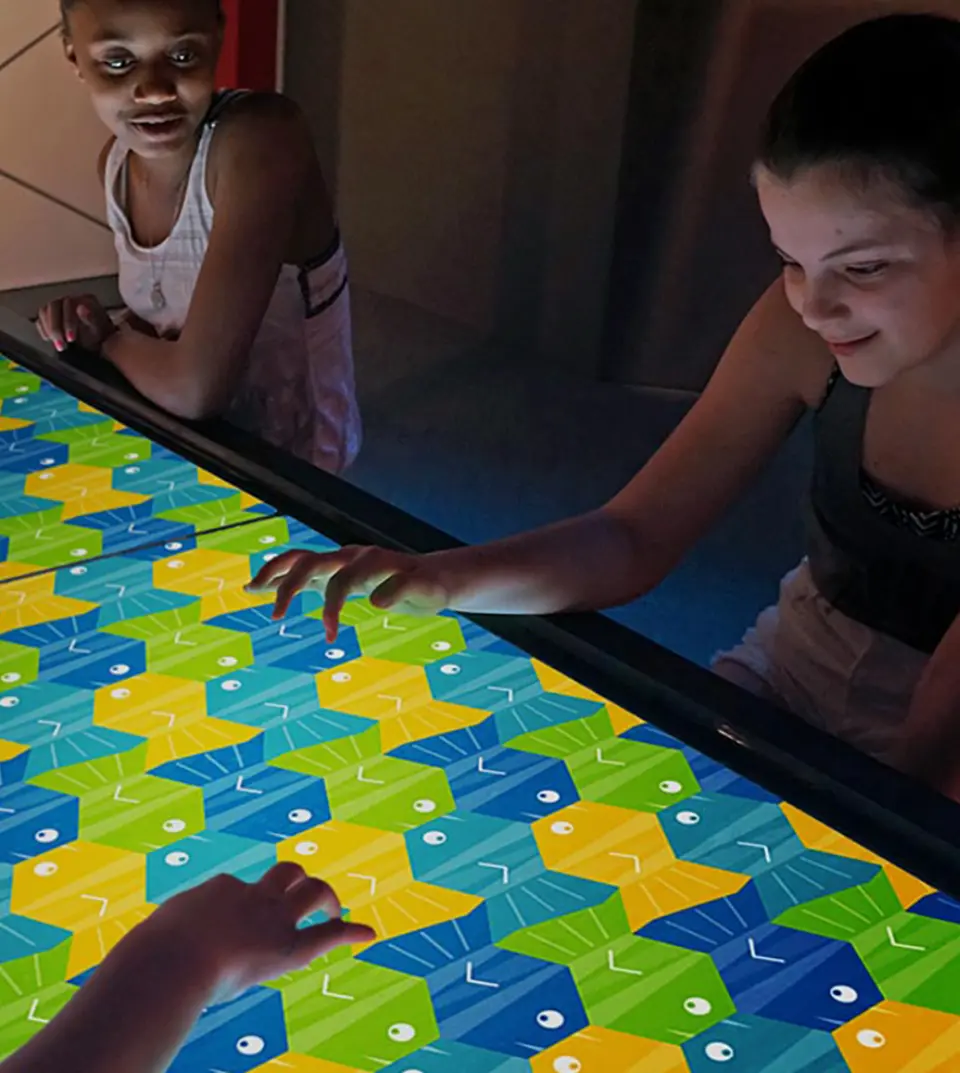 Kids around touch table